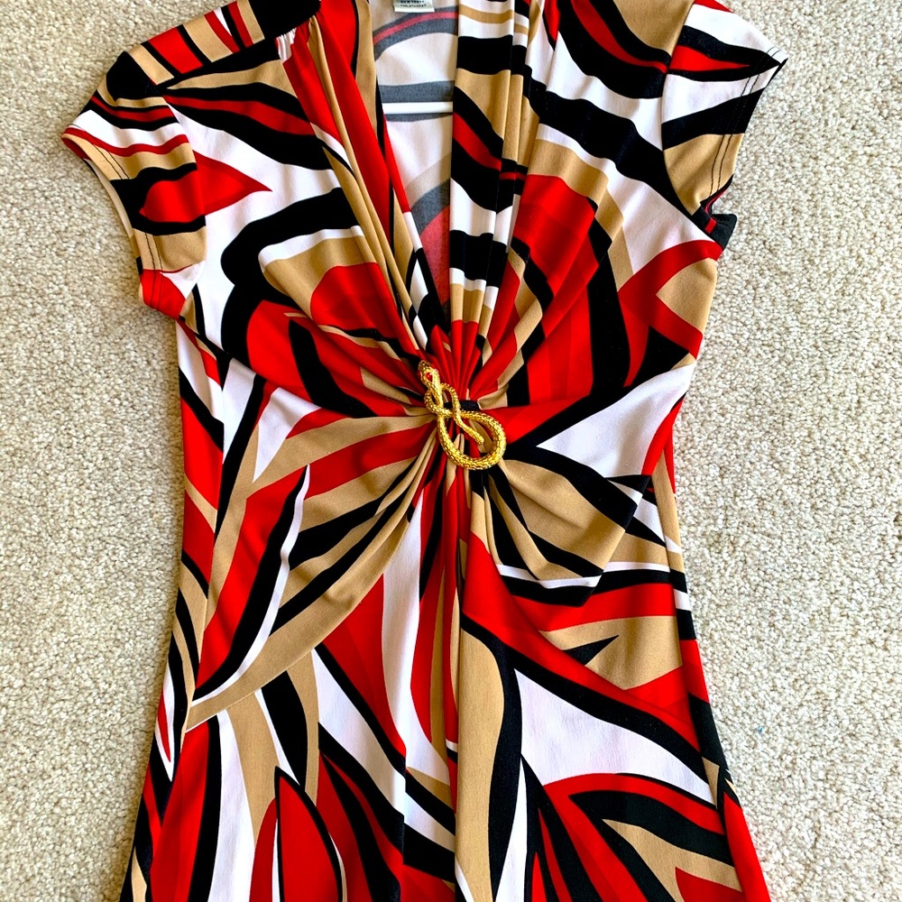 Cache short sleeve top size small.